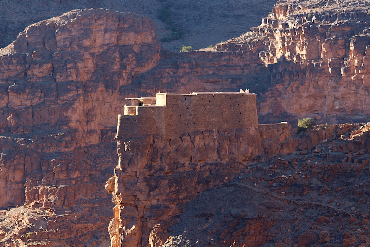 Morocco off the beaten track itinerary: suspended collective granary and shepherd's flock